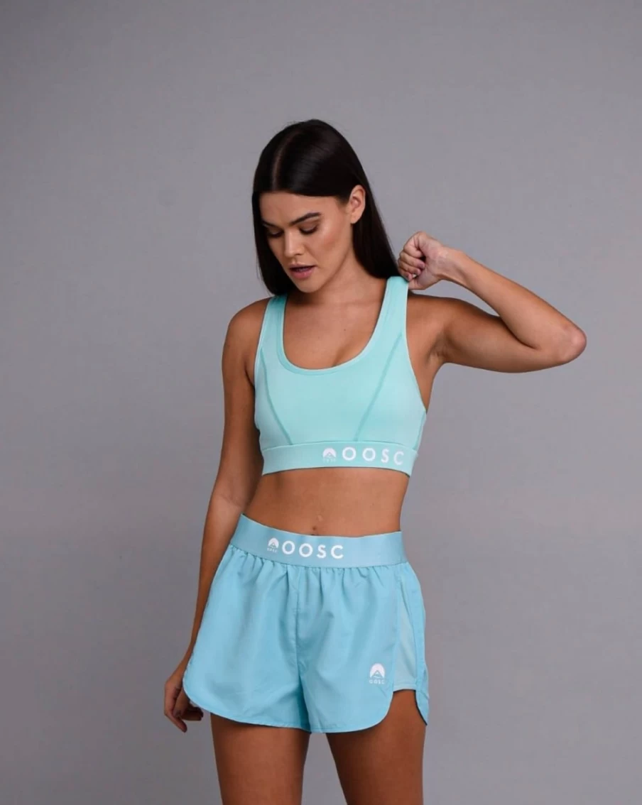 OOSC Women's Turquoise Medium Support Crossback Sports Bra for Active Workouts
